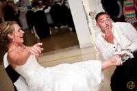 Tradition of removing the wedding garter from the bride Bride and goom taking off the garter